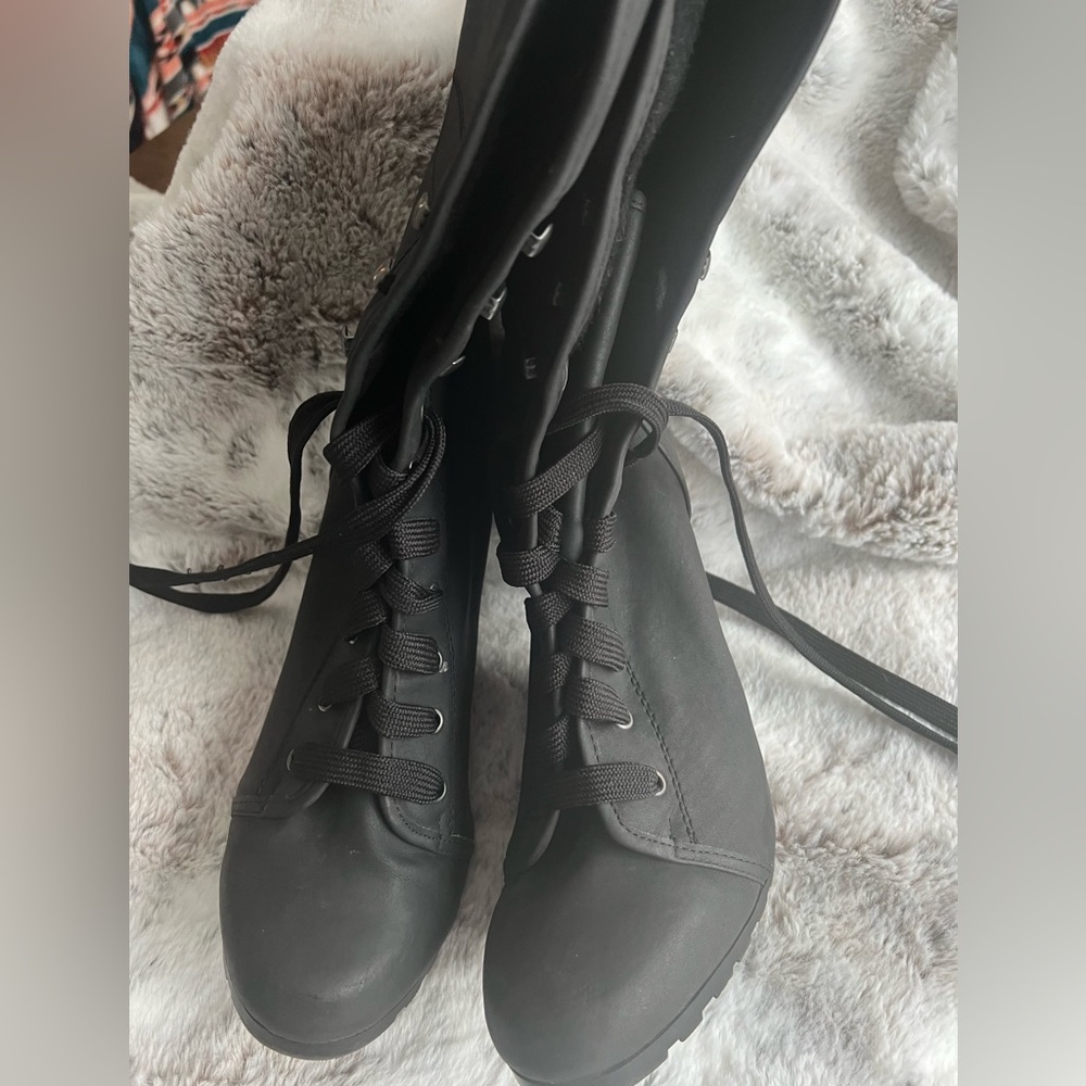 Black lace up heel boots. Size 11.